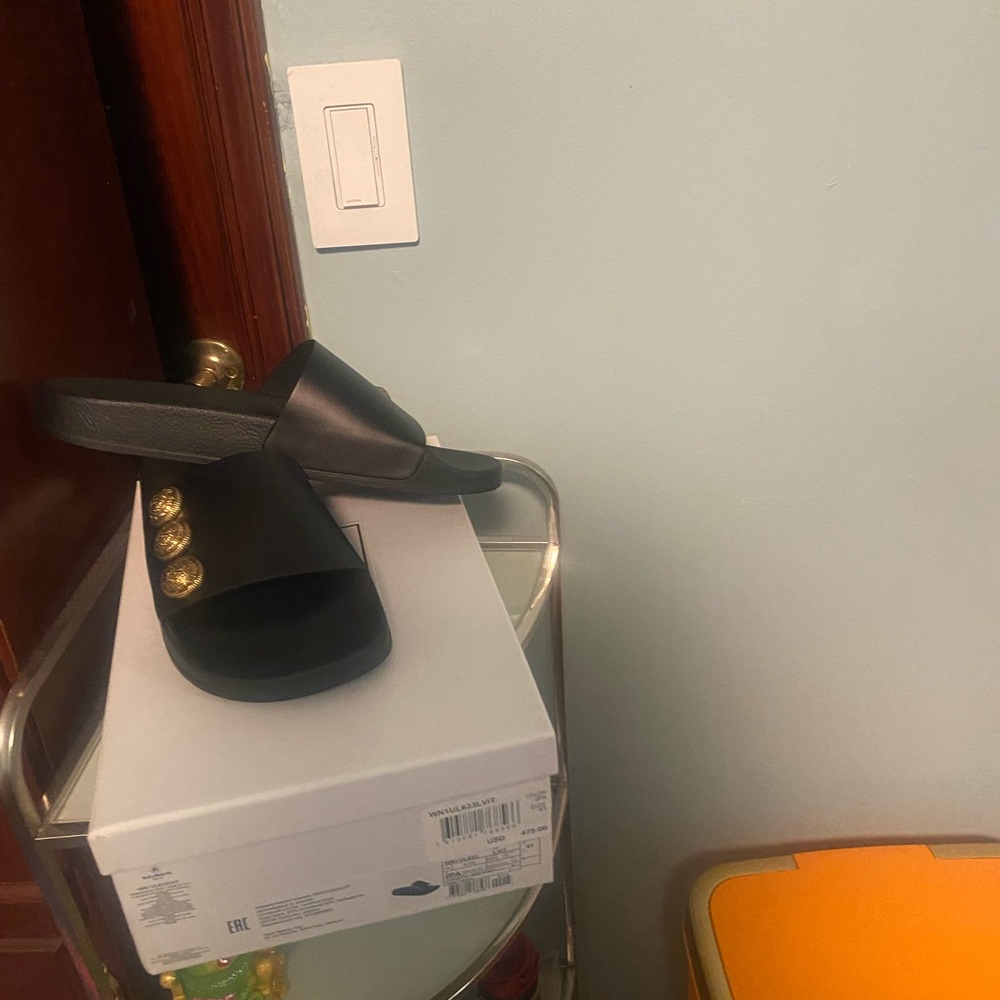 Moschino Black Slippers with Gold Accents